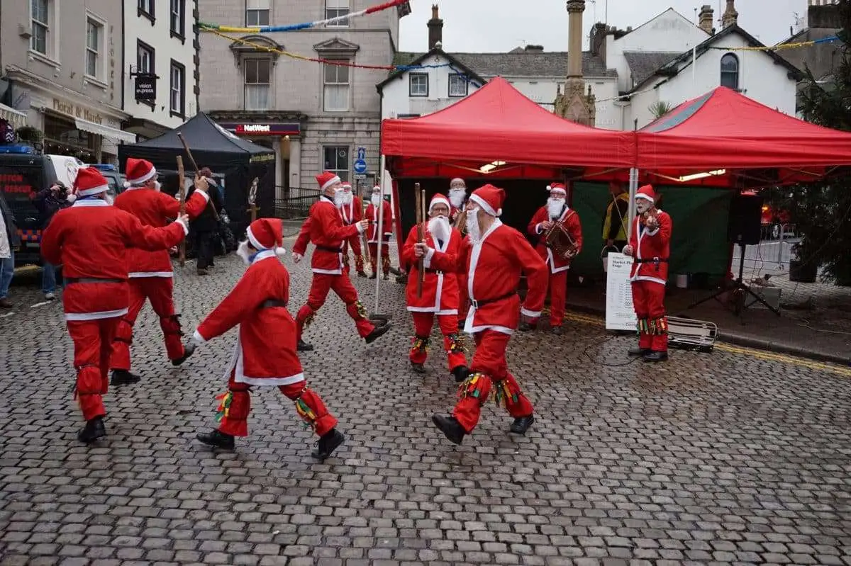 Dancing Santas in Ulverston Market Street